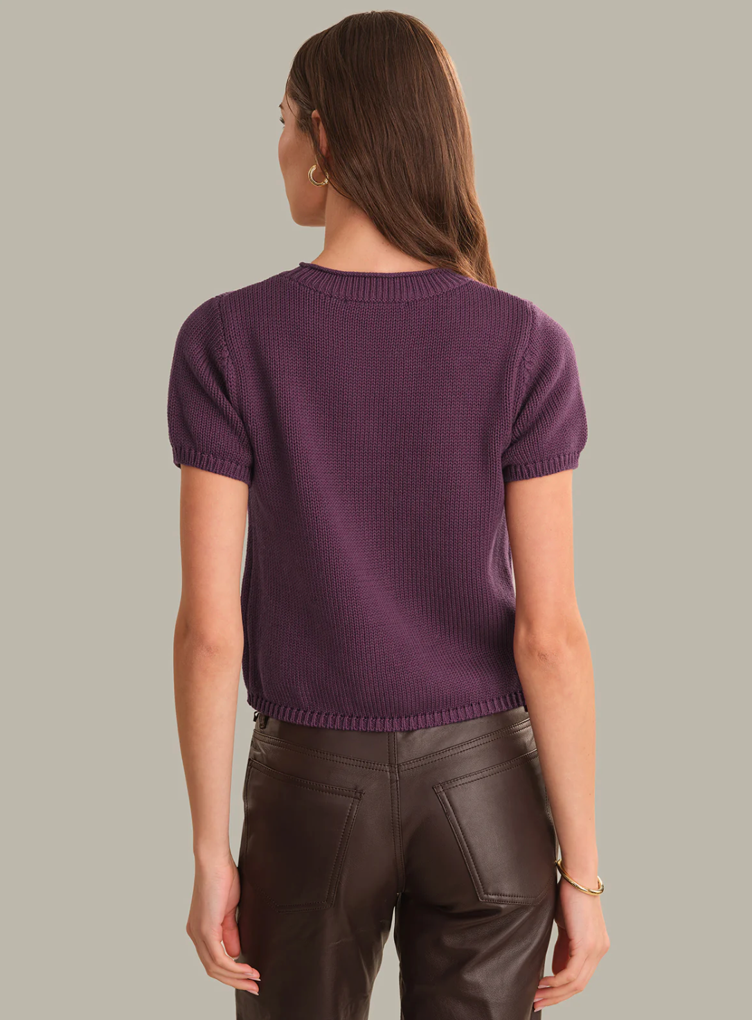 Plum lightweight sweater‑tee with soft drape and refined silhouette.