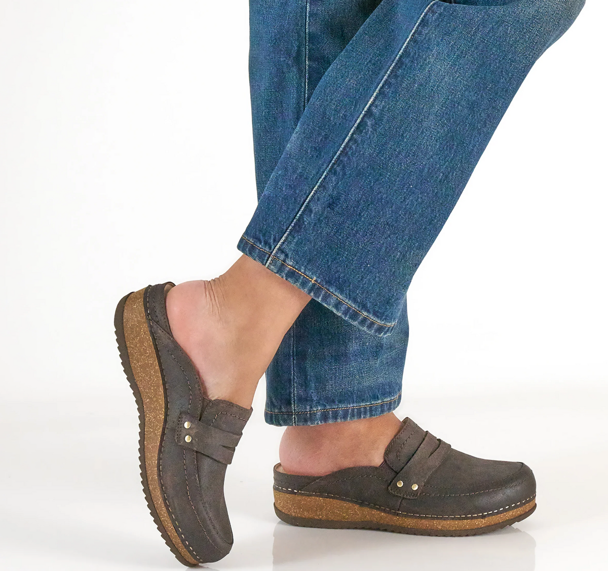 Dansko Maggy open‑back clog with burnished leather and cork/EVA midsole.