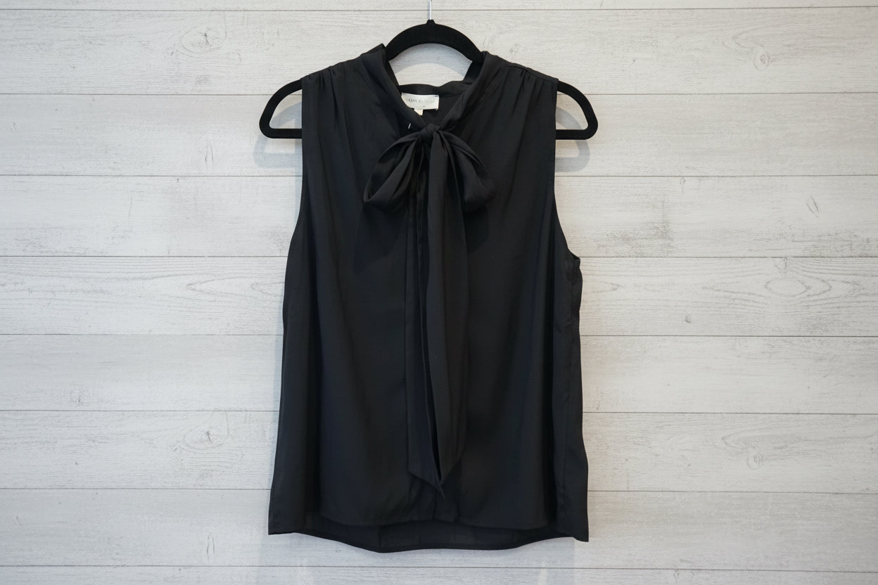Black tie‑neck button‑down blouse with soft drape and feminine neckline detail.