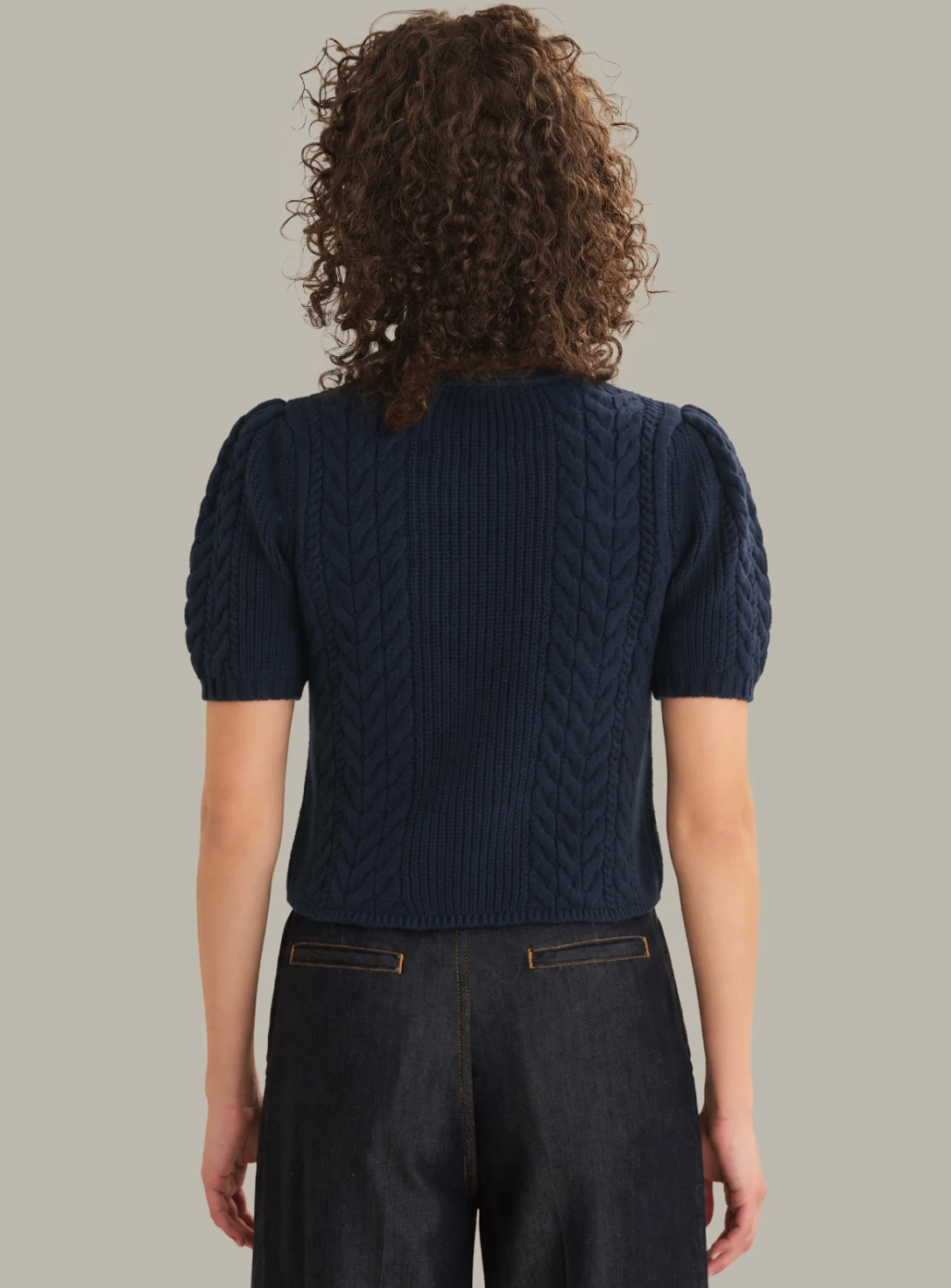 Dark‑blue 525 America Alexandra Bow Cardigan with bow‑accent placket and lightweight knit.