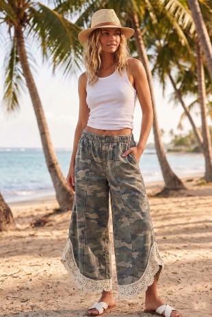 LovLov Lace Tulip Relaxed Fit Jean in camo with lace inset and tulip‑style hem.
