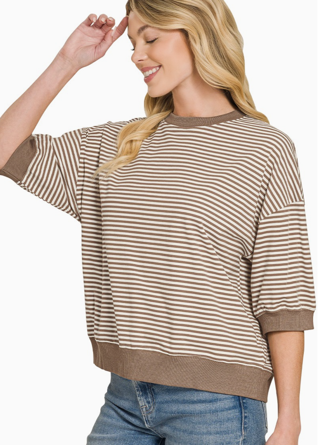 Cream and mocha striped knit top with relaxed fit and classic crew neckline.