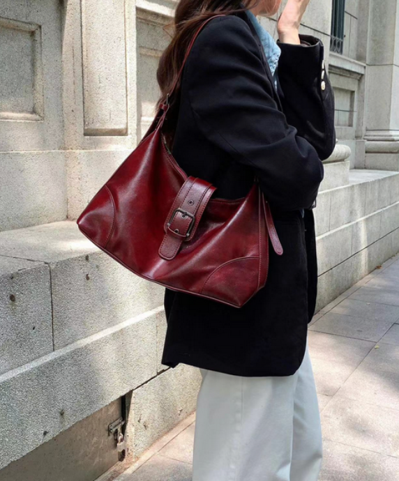 Pretty Persuasions wine faux leather hobo bag with soft slouchy silhouette and wide shoulder strap.