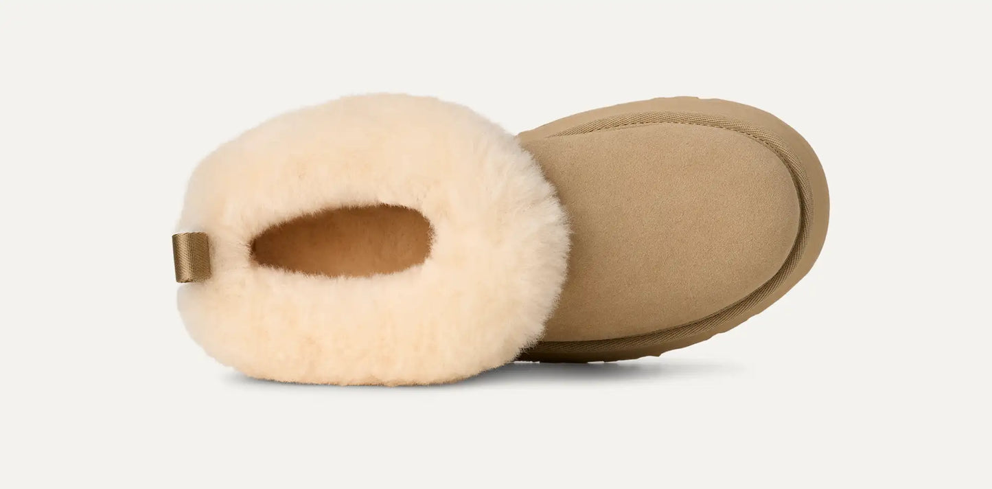 Women’s UGG Tazzelle slipper in mustard seed suede with plush UGGplush lining and a lightweight platform sole.