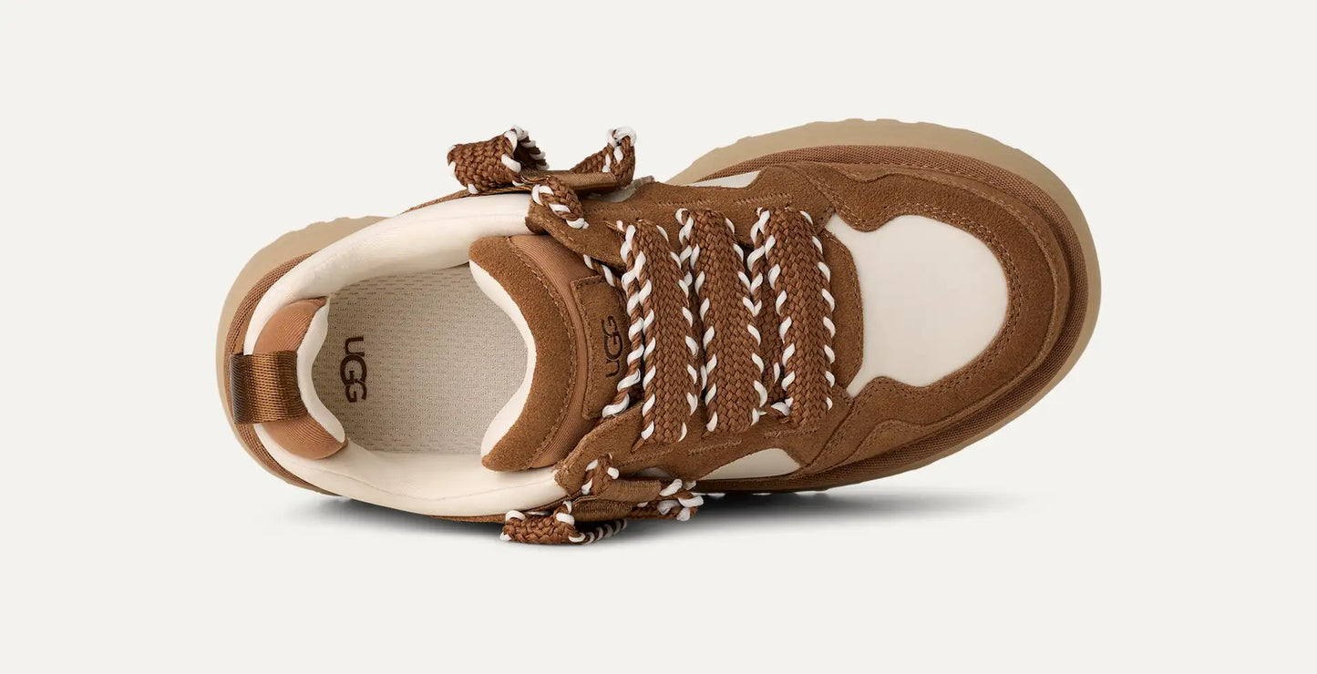 Women’s UGG Astromel sneaker in chestnut suede with mesh panels and a lightweight SugarSole EVA outsole.