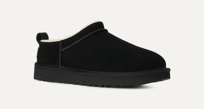 Women’s UGG Classic Micro Slipper in black suede with plush sheepskin lining and an ultra‑low silhouette.