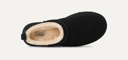 Women’s UGG Classic Micro Slipper in black suede with plush sheepskin lining and an ultra‑low silhouette.