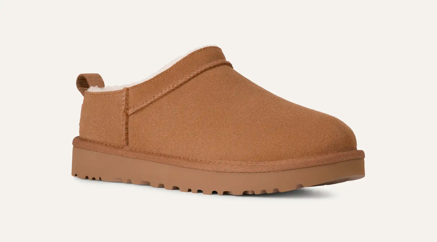 Women’s UGG Classic Micro Slipper in chestnut suede with plush sheepskin lining and an ultra‑low silhouette.