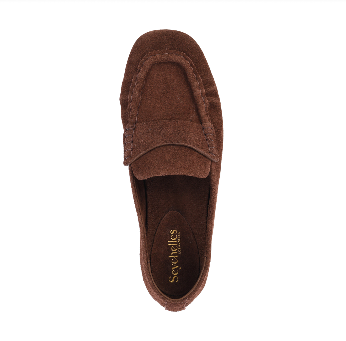A single Seychelles Day Trip brown suede moccasin loafer shown from a top-down view on a solid white background, with the brand name 'Seychelles' printed on the insole.