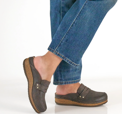 Dansko Maggy open‑back clog with burnished leather and cork/EVA midsole.