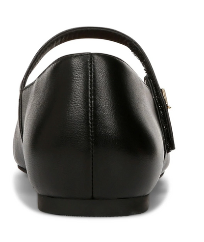 A close-up rear view of a black leather Vionic Alameda flat shoe with a strap and a small gold-tone buckle, shown on a white background.