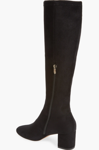 A black knee-high boot with a block heel and a side zipper, shown from a side profile view against a plain white background.