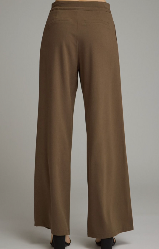 The back side of Entro Wide‑Leg Pants with Drawstring Waist featuring a lightweight woven fabric and relaxed wide‑leg silhouette.
