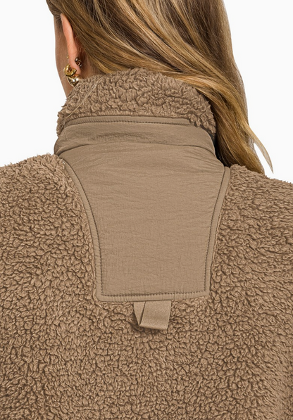 Back collar view of Zenana oversized faux‑fur vest in mocha  with plush high‑pile texture.