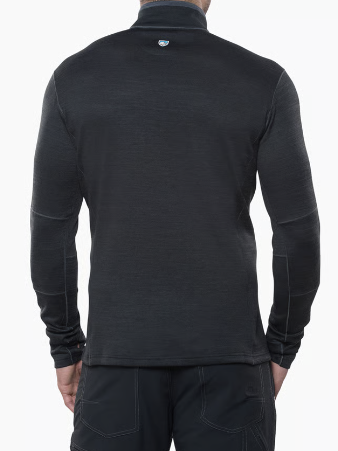 Back view of a man wearing a Kuhl Ryzer dark charcoal gray long-sleeve quarter-zip fleece pullover and dark pants, photographed against a clean white background.
