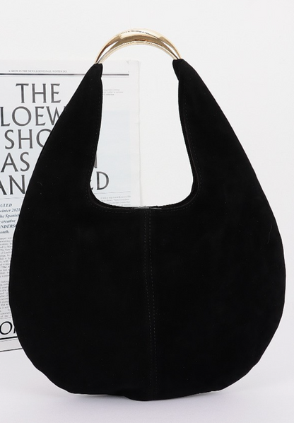 Faux suede hobo bag with relaxed silhouette and minimalist hardware in black.
