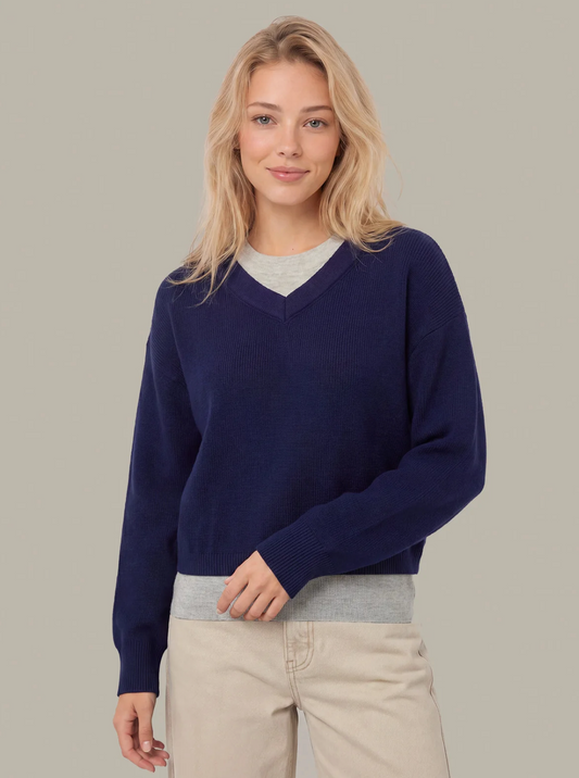 Dark‑blue lightweight v-neck pullover with soft drape and refined silhouette.