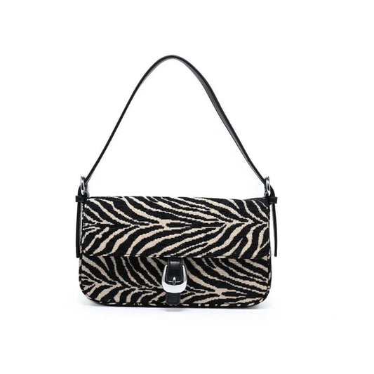 A zebra-print shoulder bag with a black leather strap and silver-tone turn-lock closure, shown against a plain white background.