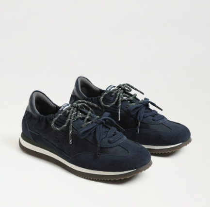 Sam Edelman Evara Lace‑Up Sneaker in navy blue with clean modern silhouette and cushioned footbed.