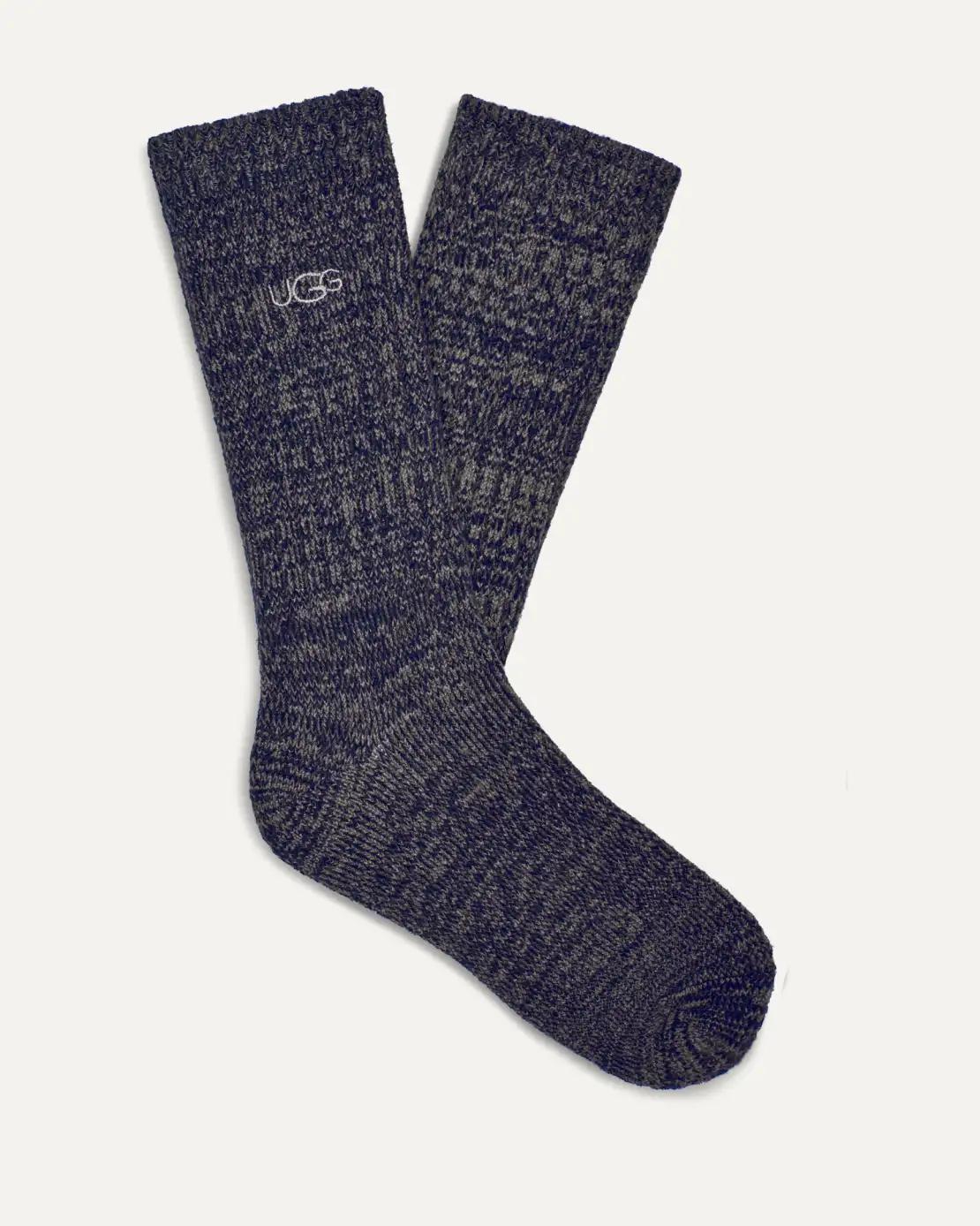 Pair of navy blue Trey Rib socks with UGG logo on a white background