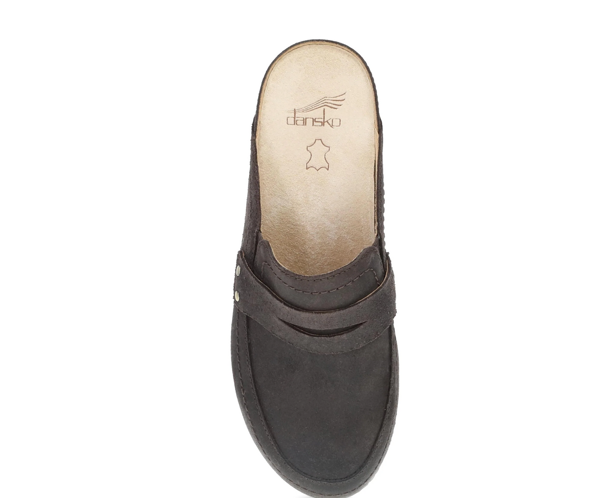 Dansko Maggy open‑back clog with burnished leather and cork/EVA midsole.