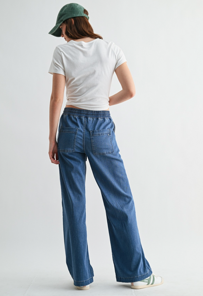 Mica Denim High Rise Wide Joggers in Navy Eyes with wide‑leg silhouette and soft‑stretch fabric.