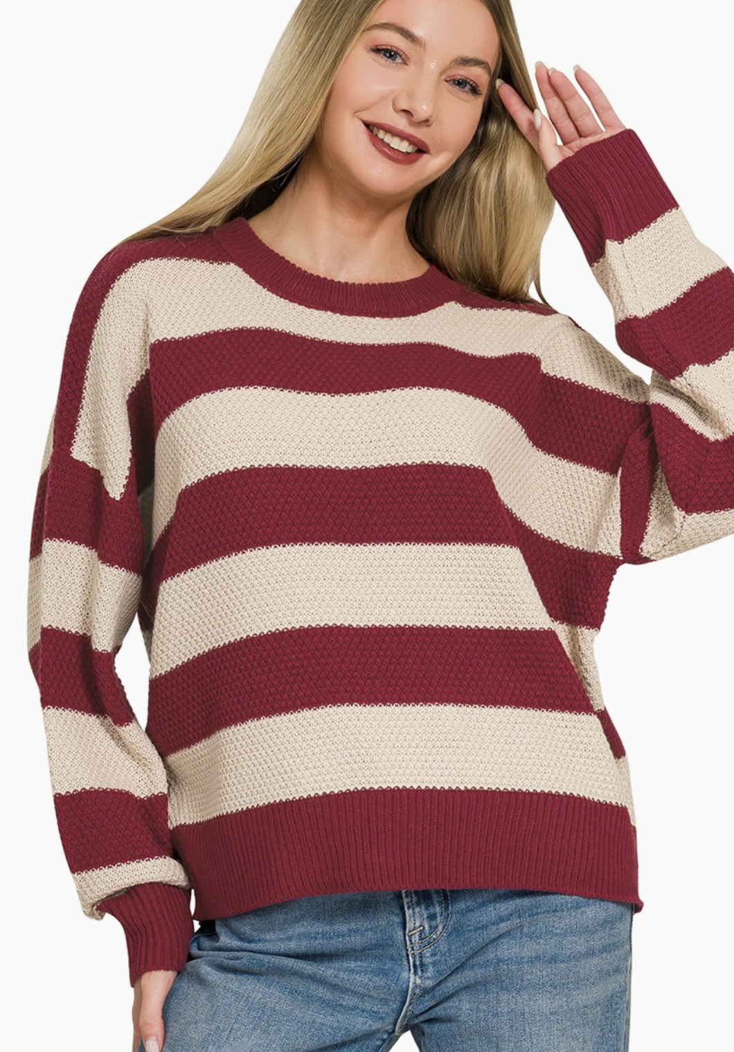 Striped crewneck sweater in burgund with a relaxed fit.
