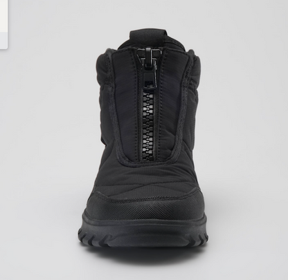 A Kamik Snowdon black mid-calf winter boot with a central zipper, shown from the front on a light gray background.