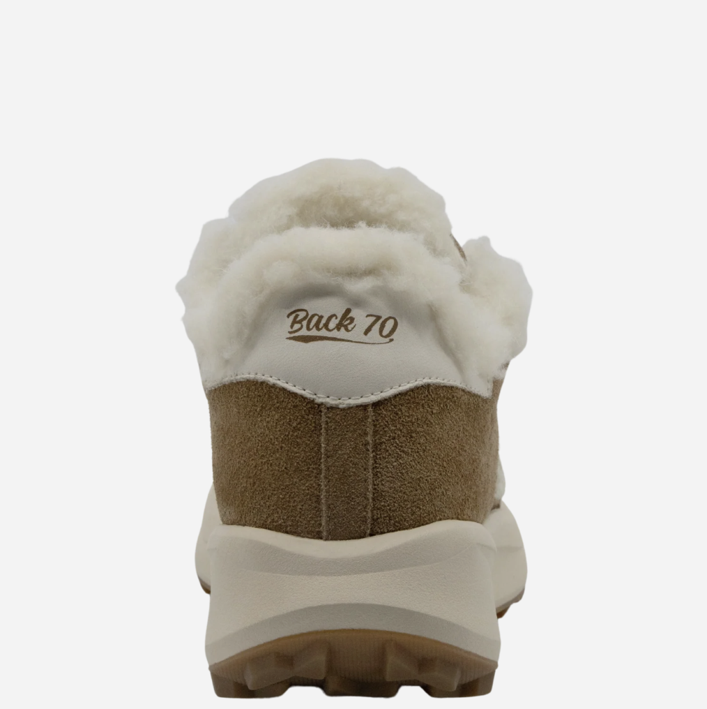 A rear view of a Back 70 sneaker featuring a thick cream-colored shearling collar, a brown suede midsole, and a cream outsole, shown against a plain white background.