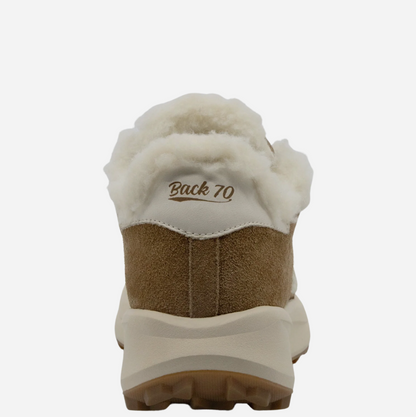 A rear view of a Back 70 sneaker featuring a thick cream-colored shearling collar, a brown suede midsole, and a cream outsole, shown against a plain white background.