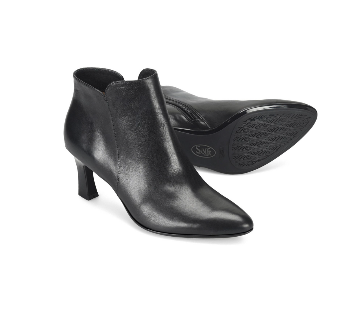 A pair of Sofft Sasha black leather ankle boots with kitten heels, shown on a clean white background. One boot is positioned upright to show the side and front profile, while the other lies on its side displaying the treaded outsole with the 'Saff' brand logo.