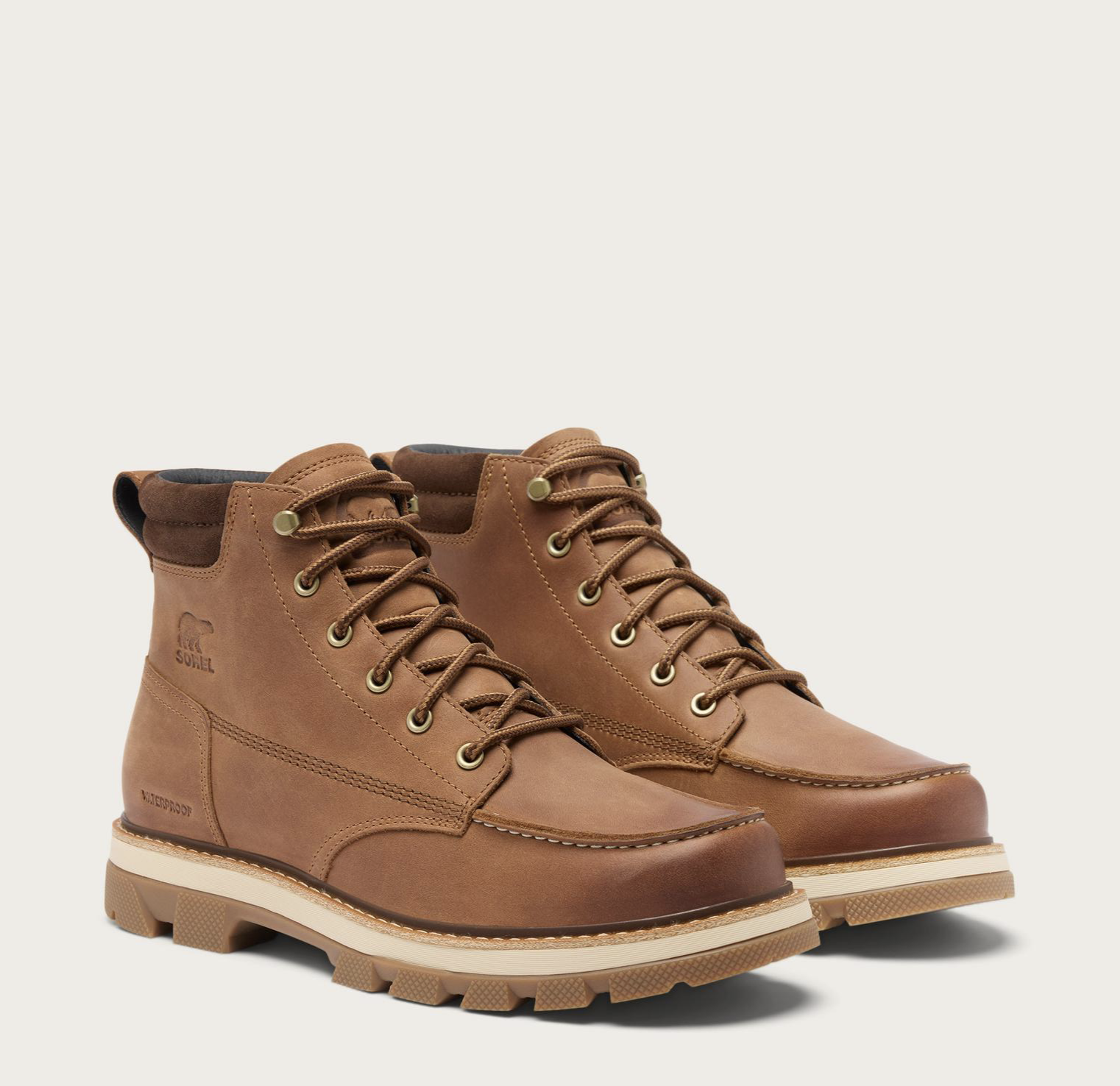 Sorel Lark‑47 men’s moc‑toe waterproof boot in velvet tan and tobacco with rugged traction outsole.