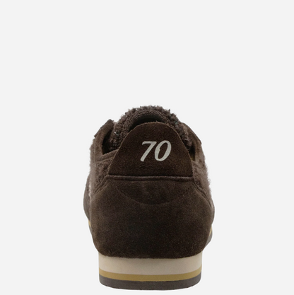 A close-up rear view of a dark brown suede Back 70 sneaker with a plush brown lining, featuring the number '70' printed in white on the heel tab and a beige and brown sole.