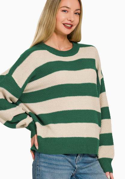 Striped crewneck sweater in light green with a relaxed fit.