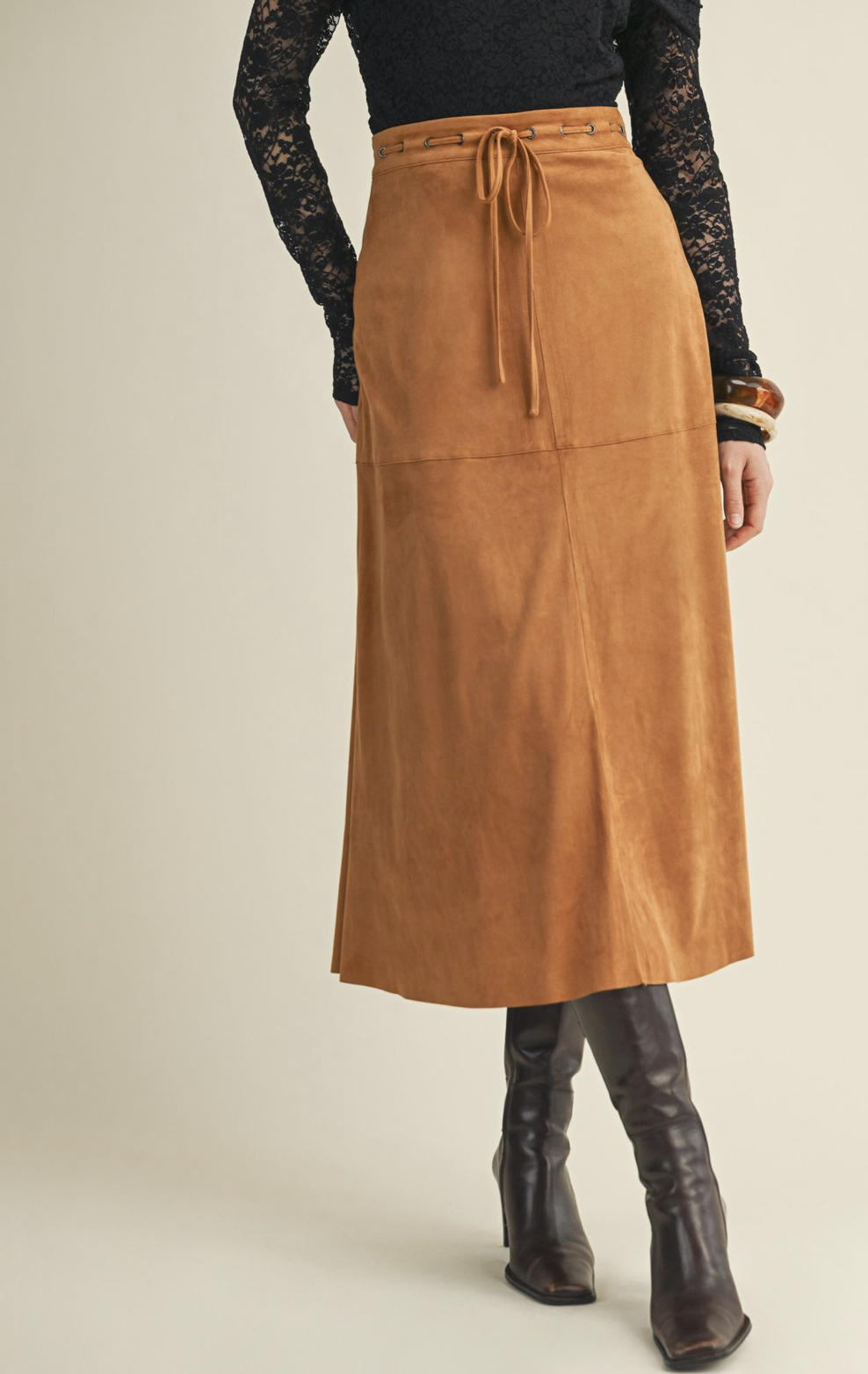Mustard Seed faux‑suede A‑line skirt in beige or camel with soft texture and flattering silhouette.