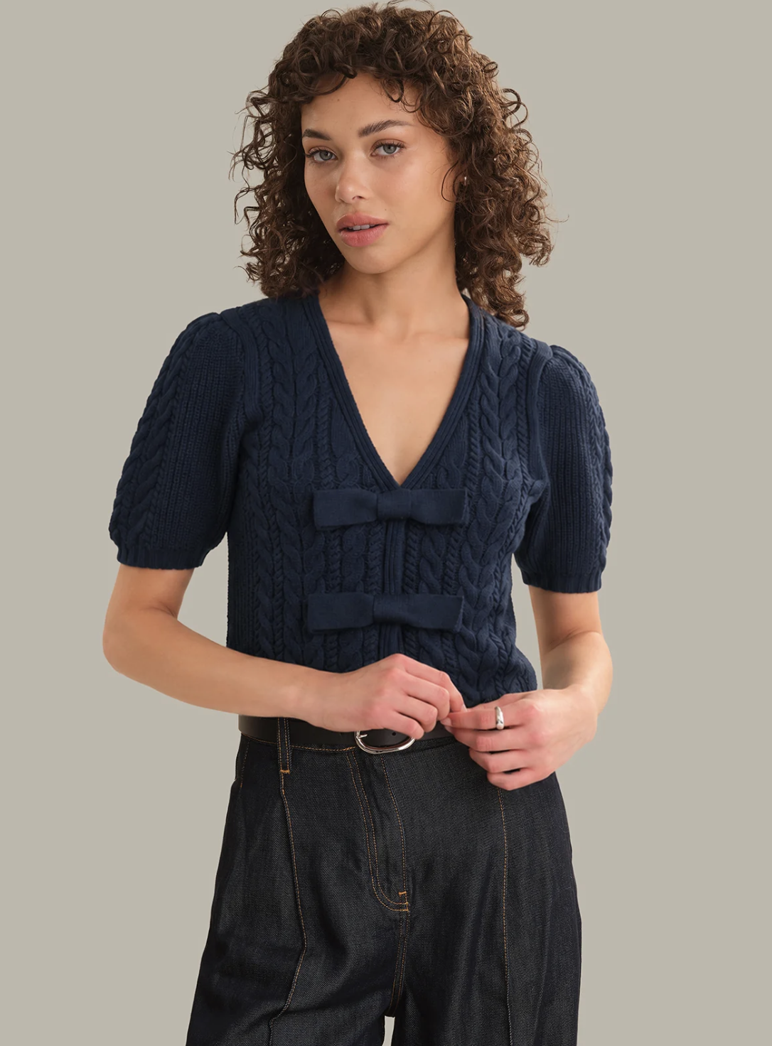 Dark‑blue 525 America Alexandra Bow Cardigan with bow‑accent placket and lightweight knit.