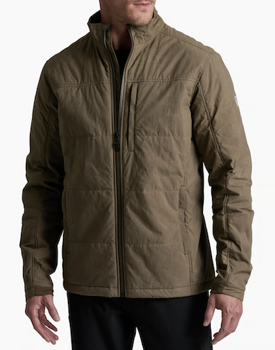 A man wearing a brown Kuhl Wylderydr  quilted jacket with a stand-up collar and front zipper, shown from the neck down against a plain white background.