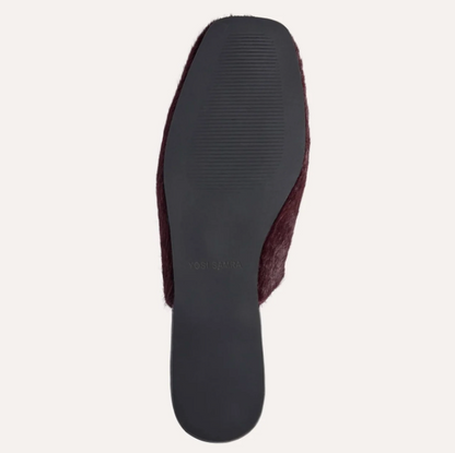 Top-down view of a single Yosi Samra Waverly slip-on shoe showing the dark gray sole and burgundy fuzzy side panel on a light gray background.