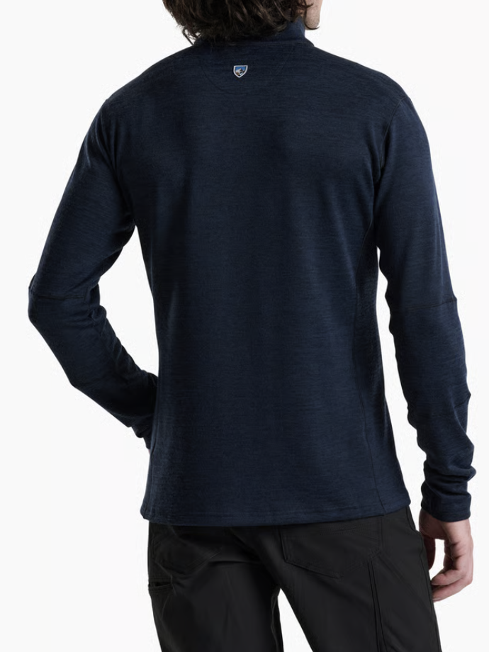 A man wearing a Kuhl Ryzer dark navy blue long-sleeve quarter-zip performance pullover, shown from the back against a clean white background.