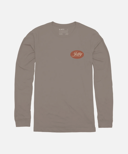 A long-sleeve crewneck t-shirt in a muted taupe-brown color, featuring the red and white 'Jetty' logo on the left chest, displayed on a clean light gray background.