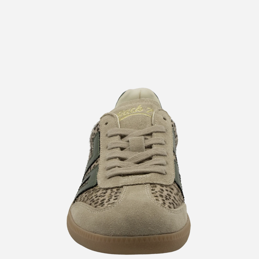 A single low-top Back 70 sneaker shown from the front on a light gray background. The shoe features a beige suede upper with leopard-print panels on the sides, olive green overlays, beige laces, and a gum brown sole.