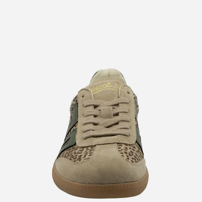 A single low-top Back 70 sneaker shown from the front on a light gray background. The shoe features a beige suede upper with leopard-print panels on the sides, olive green overlays, beige laces, and a gum brown sole.