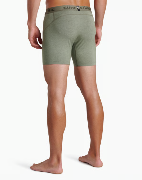 A man shown from the back wearing olive green boxer briefs with a black waistband featuring the KÜHL brand name.
