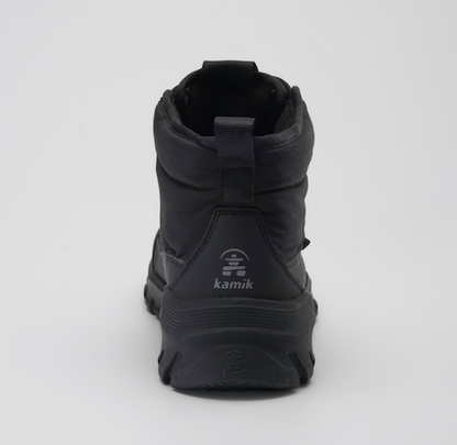 A Kamik Snowdon black mid-calf tactical boot shown from the back, featuring a pull tab and the 'kamik' logo on the heel, set against a plain light gray background.