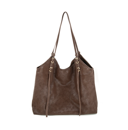 A brown suede-like slouchy tote bag with double shoulder straps and gold-tone hardware, shown against a plain white background.