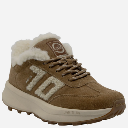 A brown suede and shearling-lined mid-top Back 70 sneaker with a chunky off-white sole, brown laces, and a brown and white logo on the side.