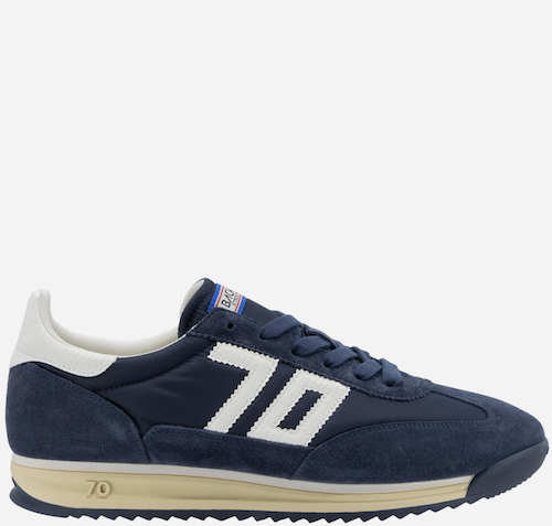 A Back 70 navy blue suede and synthetic fabric sneaker with a prominent white '70' logo on the side, a cream-colored midsole, and a white heel tab, shown from a side profile on a light gray background.