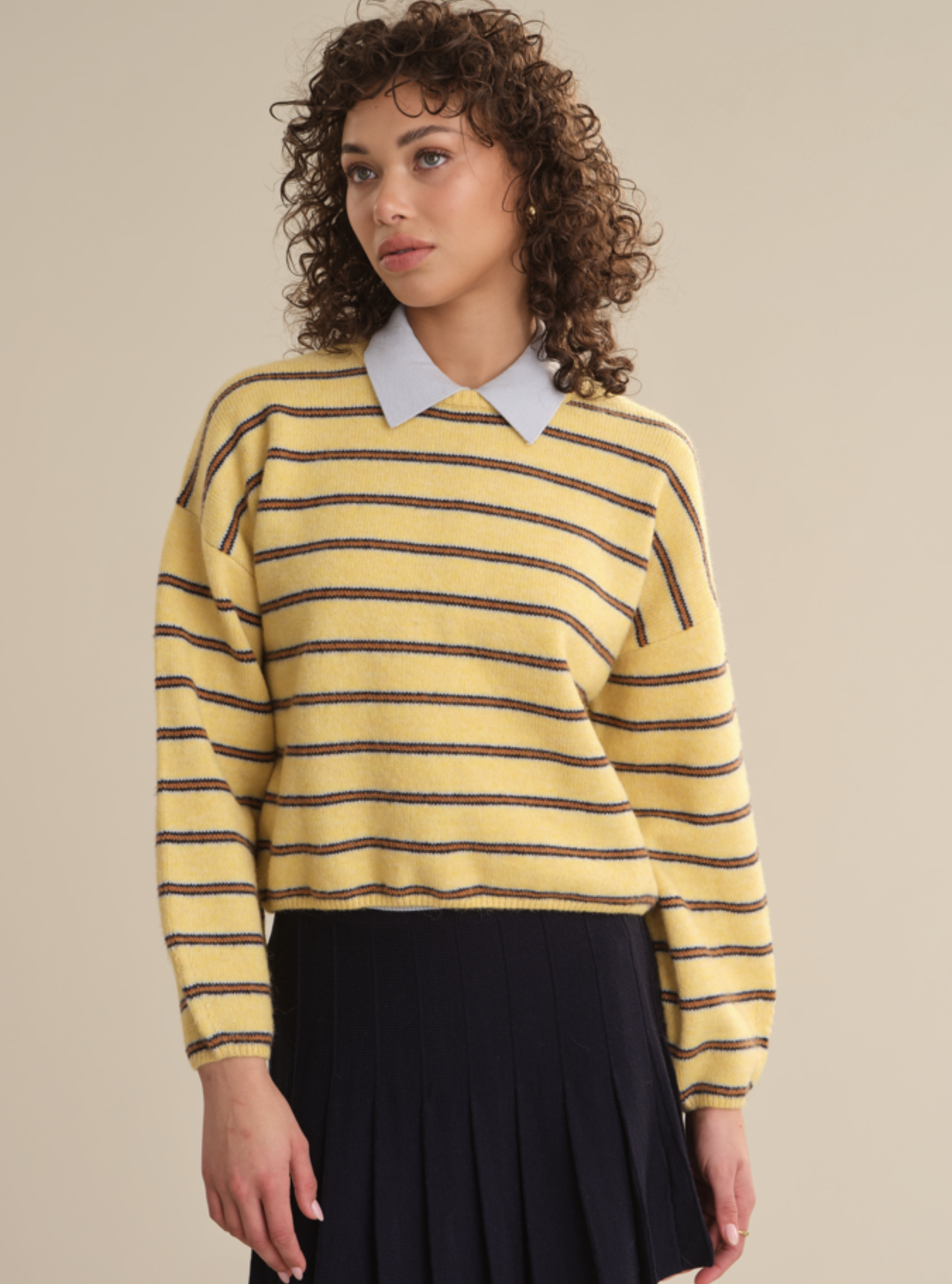 525 America Kensington cropped pullover in cream and gold stripe with lightweight knit.