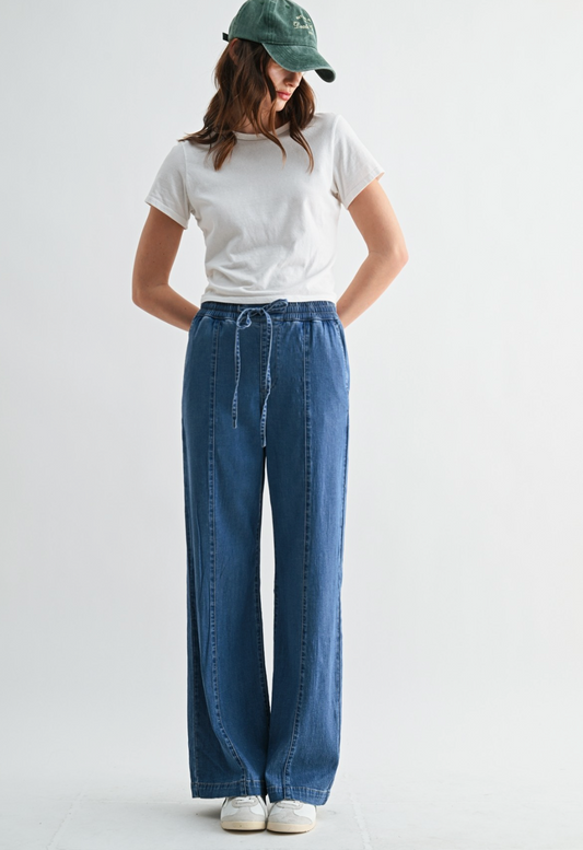 Mica Denim High Rise Wide Joggers in Navy Eyes with wide‑leg silhouette and soft‑stretch fabric.
