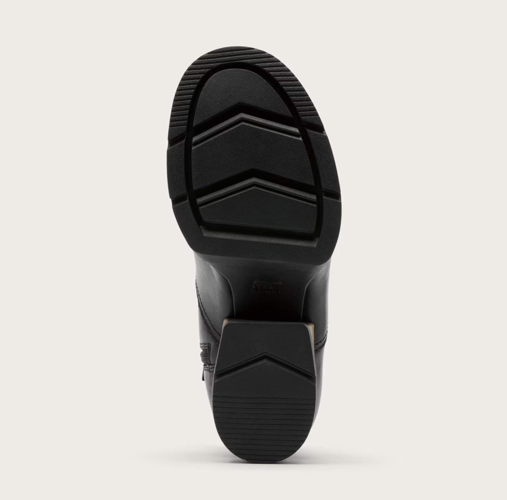 Black rubber sole of a shoe with a Sorel brand logo on a white background